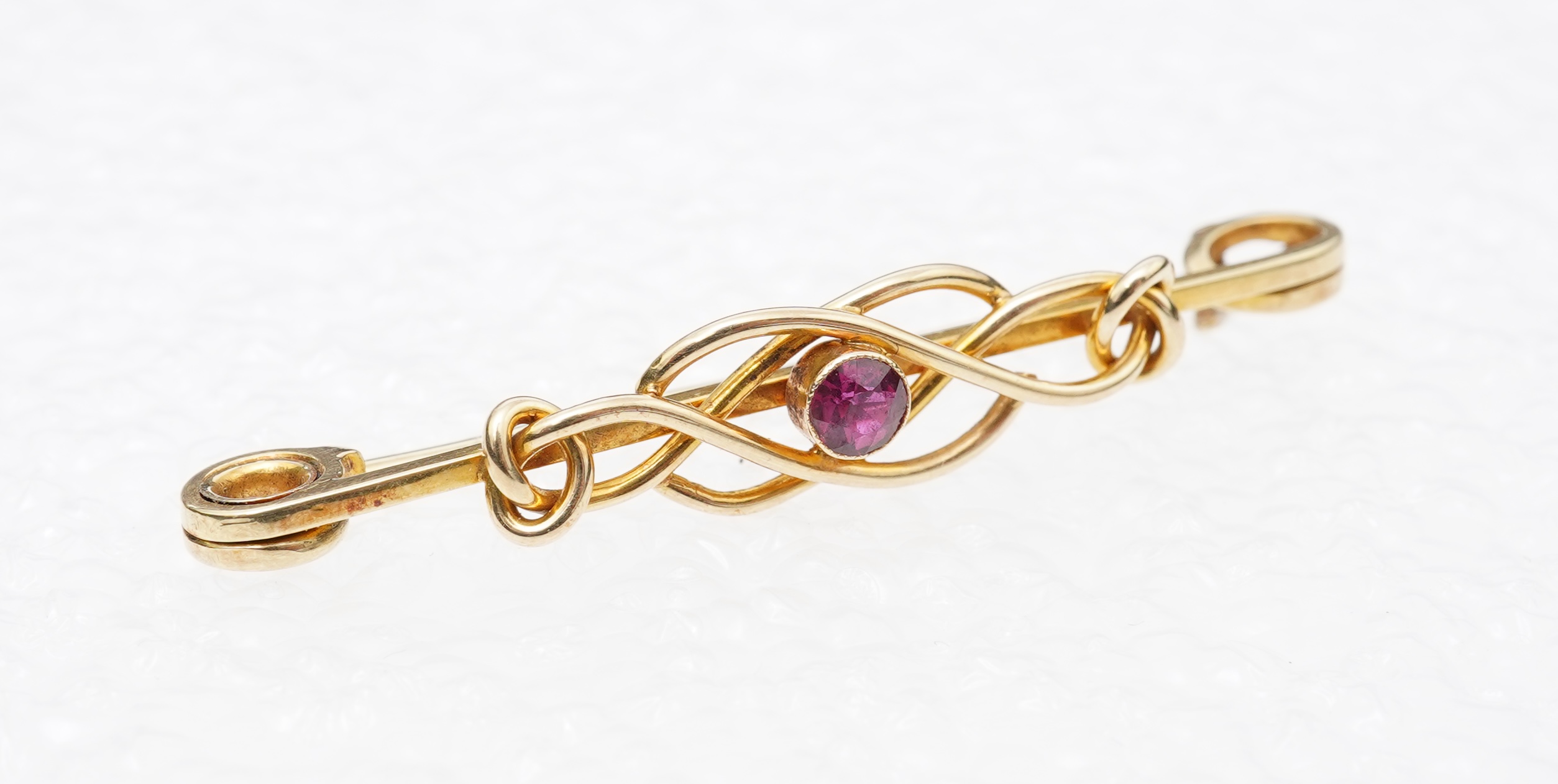 A late Victorian garnet brooch, circa 1900